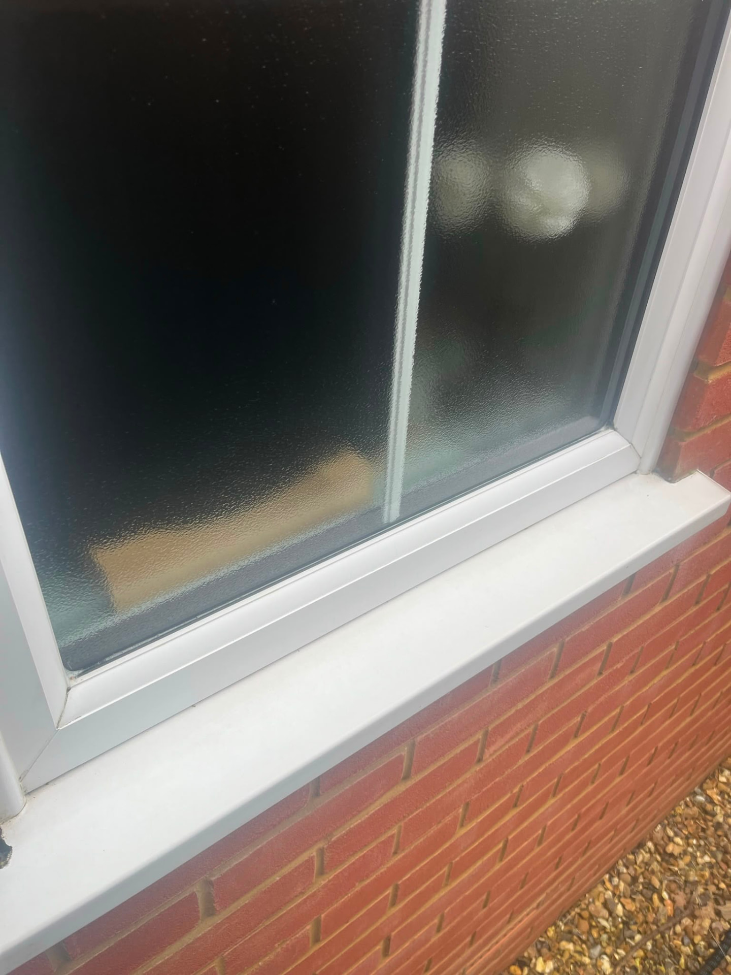 Same window and sill cleaned and clear