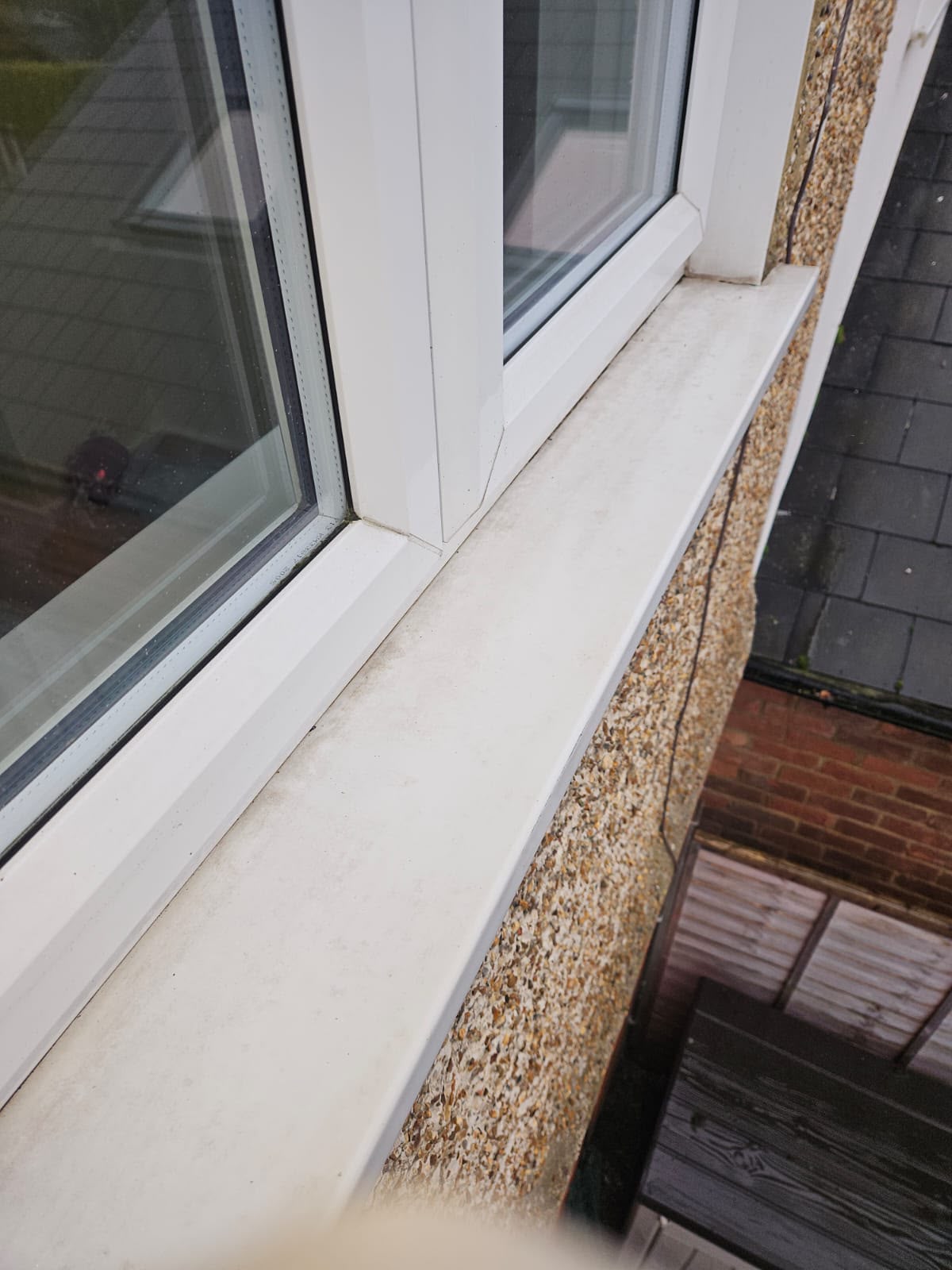 Same window sill cleaned back to white